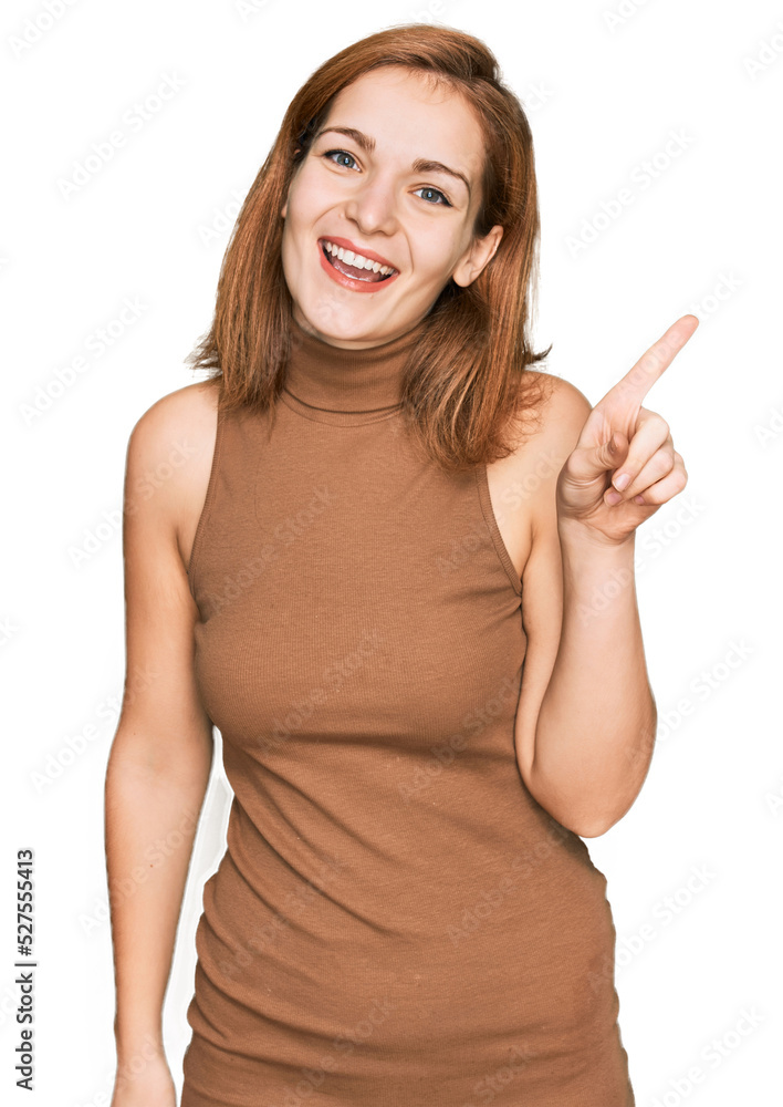 Young caucasian woman wearing casual clothes showing and pointing up with finger number one while smiling confident and happy.