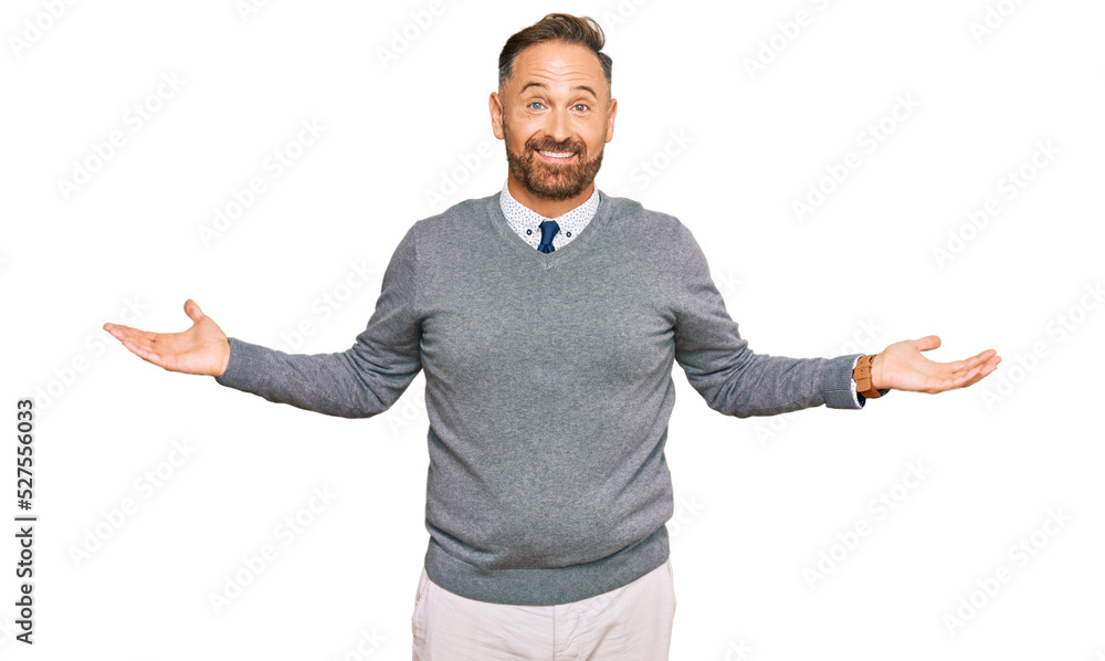 Handsome middle age man wearing business clothes smiling showing both hands open palms, presenting and advertising comparison and balance Handsome middle age man wearing business clothes smiling showing both hands open palms, presenting and advertising comparison and balance