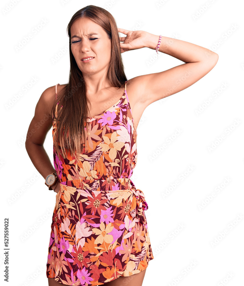 Young beautiful hispanic woman wearing casual clothes suffering of neck ache injury, touching neck with hand, muscular pain Young beautiful hispanic woman wearing casual clothes suffering of neck ache injury, touching neck with hand, muscular pain