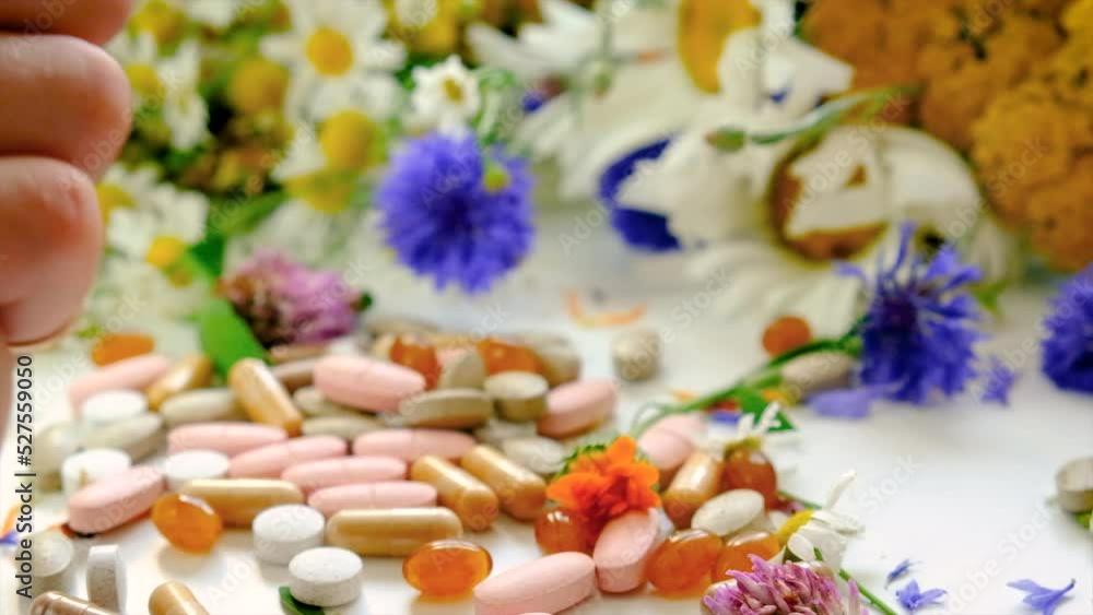 Homeopathy and dietary supplements with medicinal herbs. Selective focus. Homeopathy and dietary supplements with medicinal herbs. Selective focus.