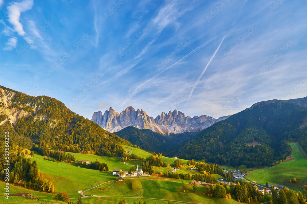 Famous best alpine place of the world, Santa Maddalena village with magical Dolomites mountains in background, Val di Funes valley