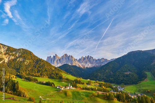 Famous best alpine place of the world, Santa Maddalena village with magical Dolomites mountains in background, Val di Funes valley © Ryzhkov Oleksandr