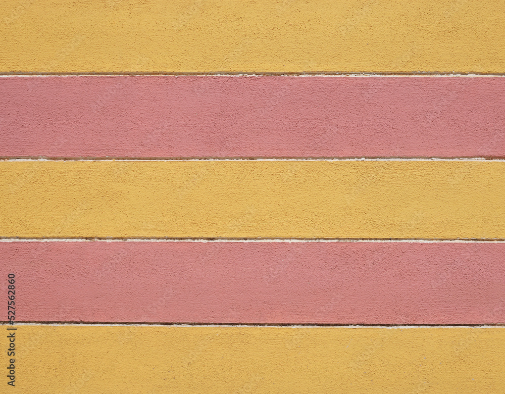 Textured pink yellow wall background. Lovely two colors backdrop Textured pink yellow wall background. Lovely two colors backdrop