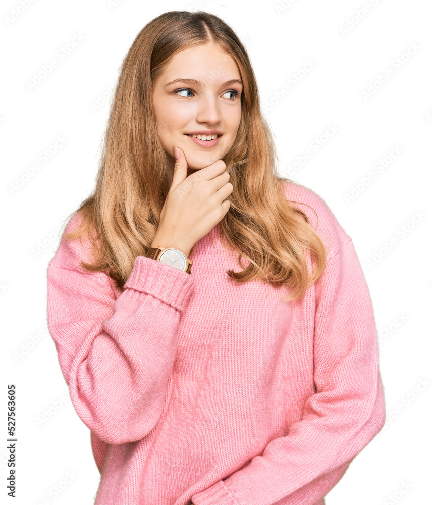 Beautiful young caucasian girl wearing casual winter sweater with hand on chin thinking about question, pensive expression. smiling with thoughtful face. doubt concept. Beautiful young caucasian girl wearing casual winter sweater with hand on chin thinking about question, pensive expression. smiling with thoughtful face. doubt concept.
