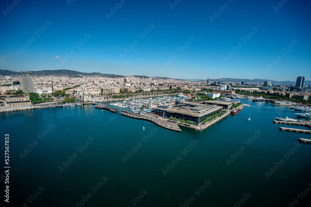 Panorama of Barcelona. City and port. Sunny day
