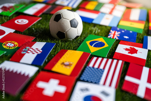 Football Ball and Flags of all 32 Countries which will play in Qatar. Soccer wallpaper