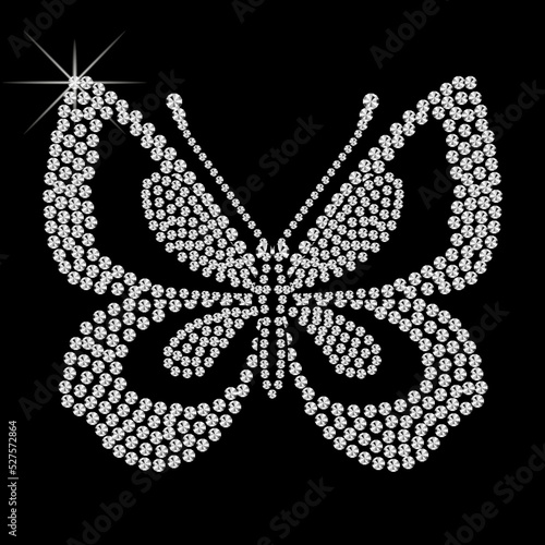 Butterfly of diamonds. Beautiful pattern embroidery of flying diamond butterfly. Shiny, silver and black print with diamonds, embroidery and jewelry. Isolated fashion abstract background.