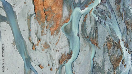 Icelandic river and waterfall with mountains on the background drone show in 4K