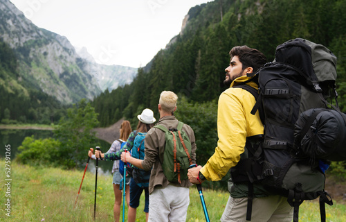 Group of friends on a hiking, camping trip in the mountains