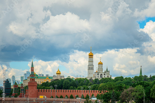 Kremlin embankment on River Moscow. On background Grand Kremlin palace, Church Of The Kremlin.