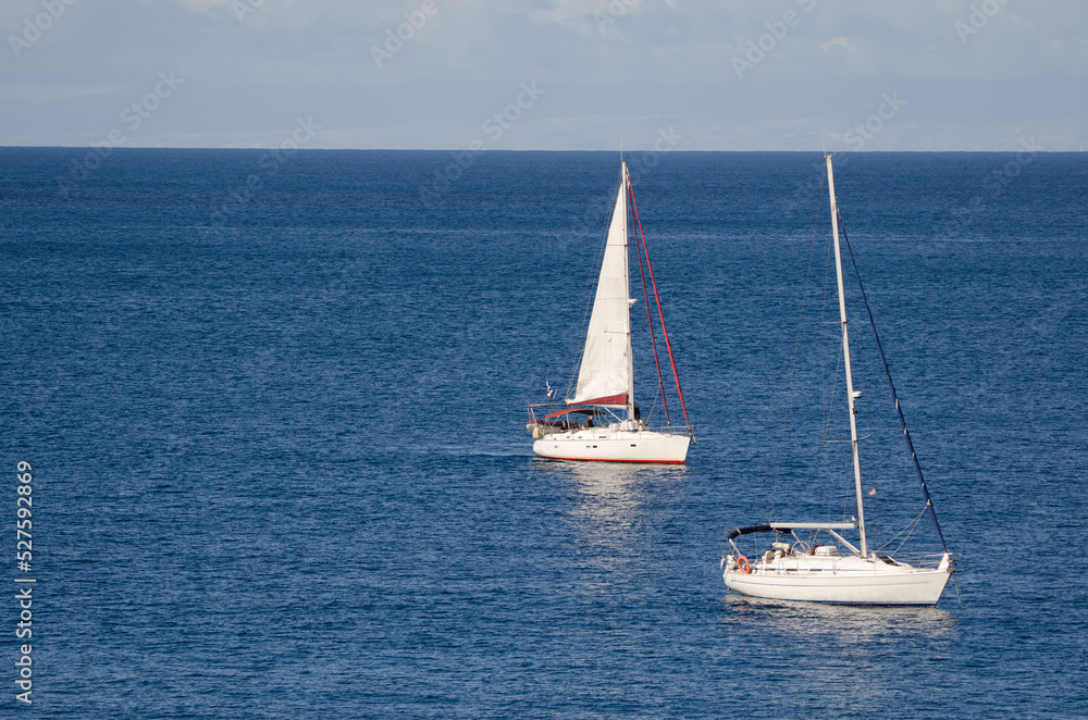 Yachts in the coast of Sardina del Norte. Galdar. Gran Canaria. Canary Islands. Spain. Yachts in the coast of Sardina del Norte. Galdar. Gran Canaria. Canary Islands. Spain.
