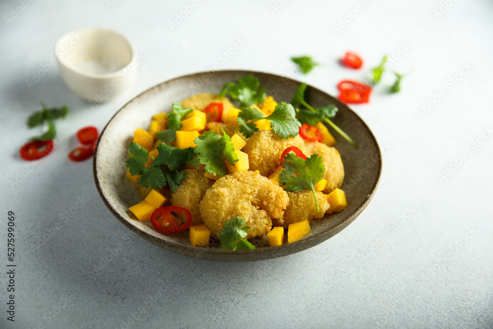 Deep fried shrimps with mango salsa Deep fried shrimps with mango salsa