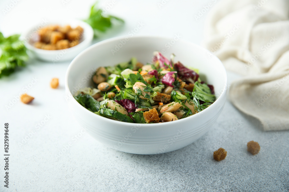 Healthy vegetable salad with white bean Healthy vegetable salad with white bean