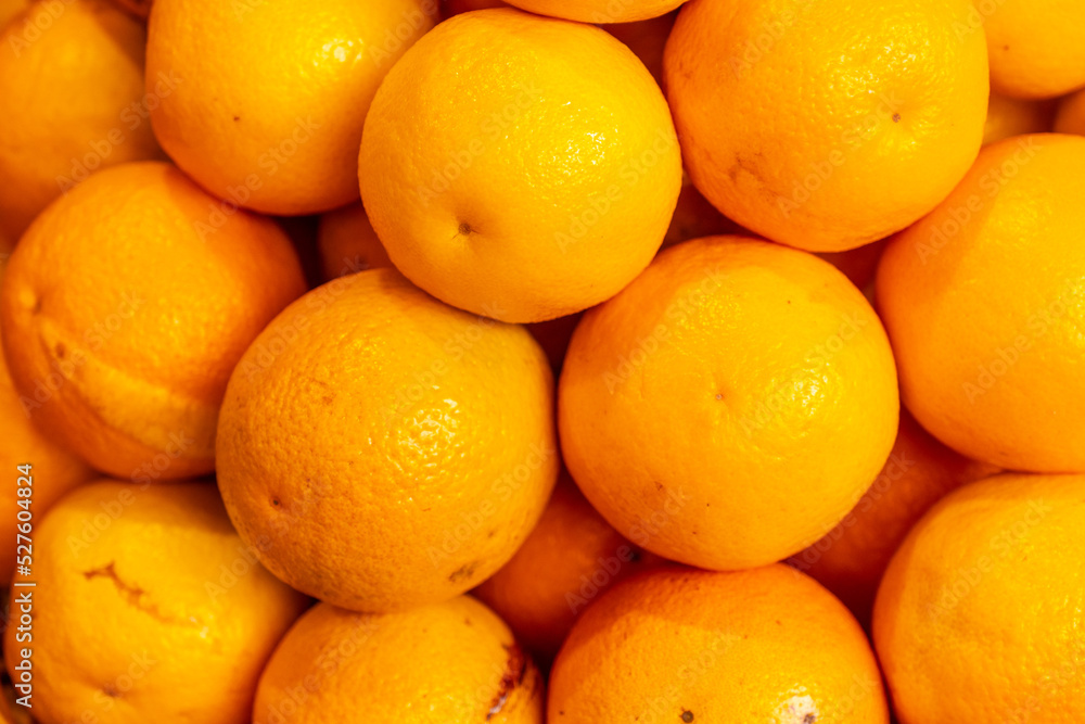Orange fruit at the Farmers Market in the Madeira city of Funchal. Portugal Orange fruit at the Farmers Market in the Madeira city of Funchal. Portugal