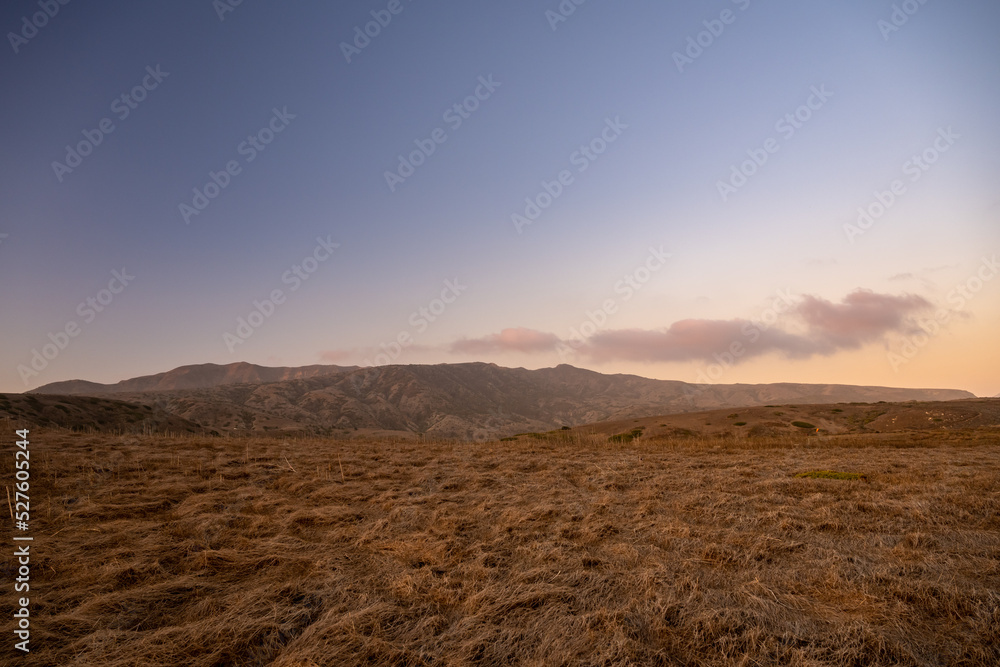 Fototapeta premium Dry Field Sits Below the High Ridge On Santa Cruz Island