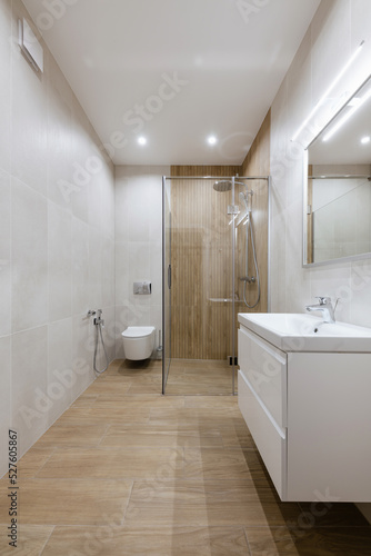 Tile bathroom interior design. Bath and sink for washing