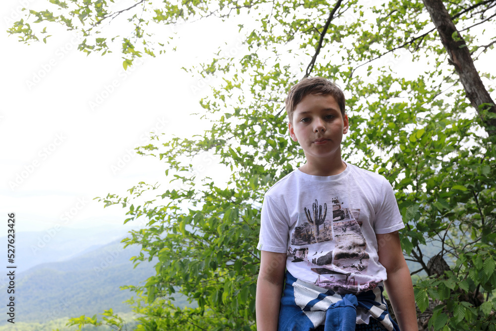 Portrait of kid on Azish-Tau ridge background Portrait of kid on Azish-Tau ridge background