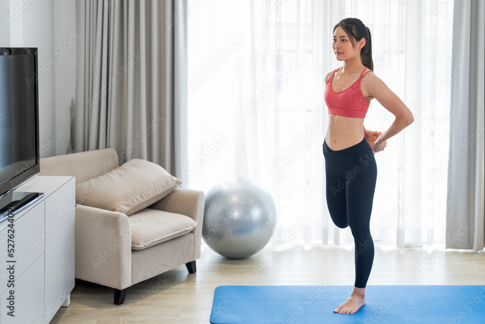 Woman doing exercise and yoga session at home. Woman doing exercise and yoga session at home.