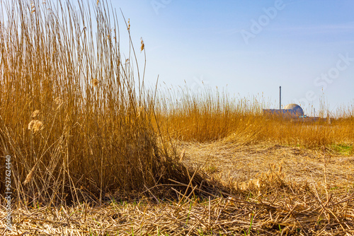 Atomic nuclear power station wadden sea tidelands coast landscape Germany. photo