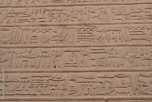 ancient egyptian hieroglyphics carved on the walls of Kom Ombo temple 
