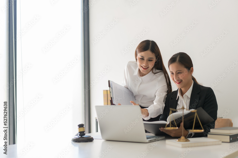 Law concept, Two female lawyers discussing about contract and agreement of business in law firm