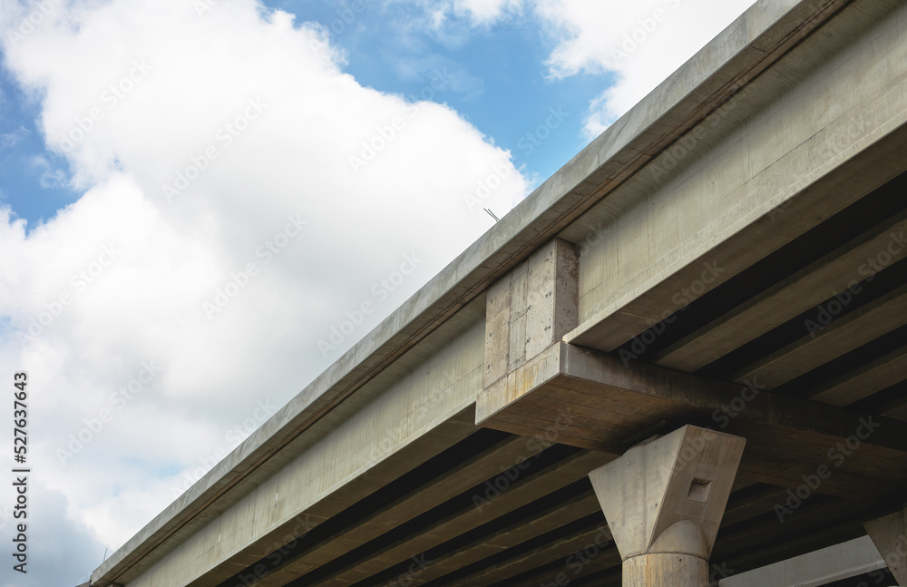 Section of newly constructed elevated highway.Shot against a bright blue sky. Section of newly constructed elevated highway.Shot against a bright blue sky.