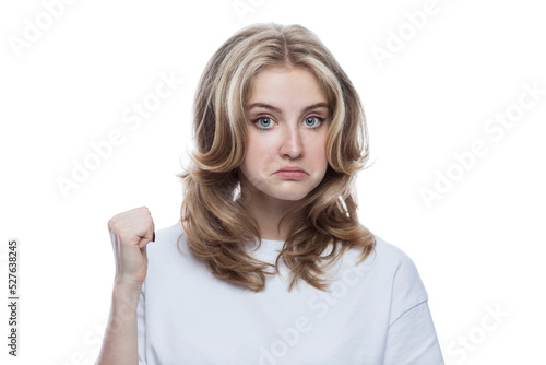 Surprised teen girl in a white T-shirt. Emotions and sensitivity. Isolated on white background. Close-up.
