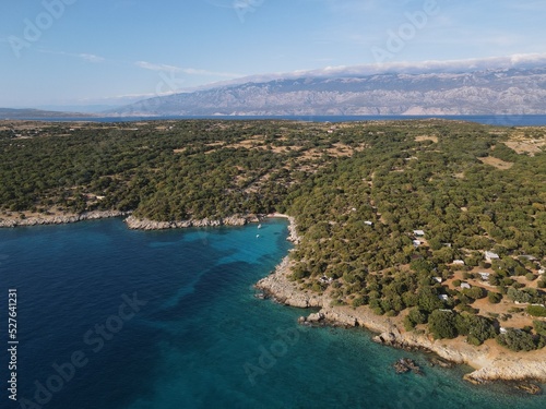 Aerial view of Potocnica, Lun and Novalja in island of Pag, archipelago of Croatia. Panoramic drone view of waterfront, idyllic and turquoise sea in Novalja, Adriatic Sea in Dalmatia region. © AerialDronePics