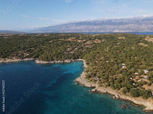Aerial view of Potocnica, Lun and Novalja in island of Pag, archipelago of Croatia. Panoramic drone view of waterfront, idyllic and turquoise sea in Novalja, Adriatic Sea in Dalmatia region.  © AerialDronePics