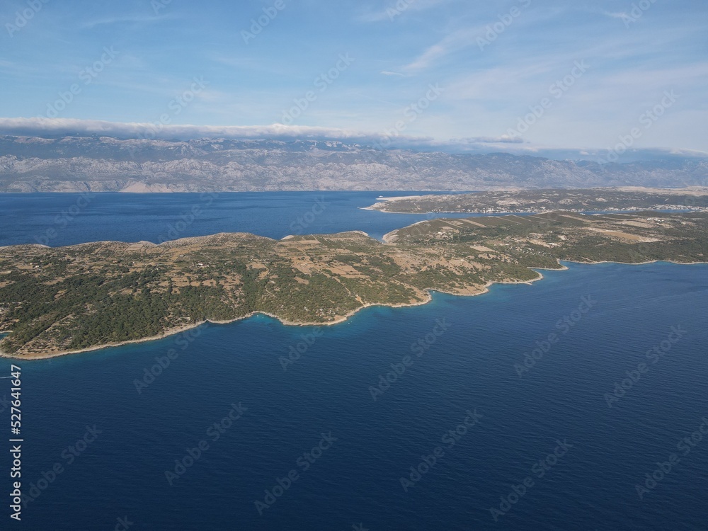 Obraz premium Aerial view of Potocnica, Lun and Novalja in island of Pag, archipelago of Croatia. Panoramic drone view of waterfront, idyllic and turquoise sea in Novalja, Adriatic Sea in Dalmatia region.