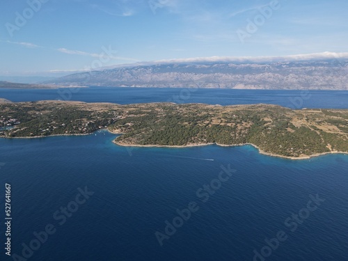 Aerial view of Potocnica, Lun and Novalja in island of Pag, archipelago of Croatia. Panoramic drone view of waterfront, idyllic and turquoise sea in Novalja, Adriatic Sea in Dalmatia region. 
