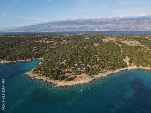 Aerial view of Potocnica, Lun and Novalja in island of Pag, archipelago of Croatia. Panoramic drone view of waterfront, idyllic and turquoise sea in Novalja, Adriatic Sea in Dalmatia region. 