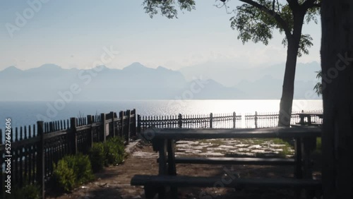 Wallpaper Mural Park benches on the edge of a cliff overlooking the sea and mountains. Torontodigital.ca