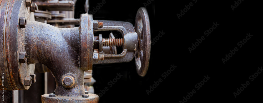 Valves, copper pipes. Old stove. Industrial, metal, mechanical factory background. Loft Valves, copper pipes. Old stove. Industrial, metal, mechanical factory background. Loft