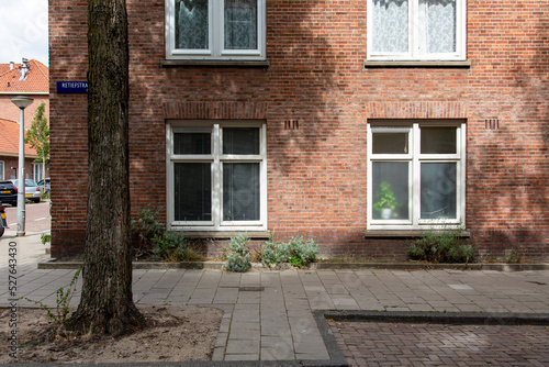 Typical Dutch1930s house front in the popular east part of Amsterdam - Transvaal neighborhood, The Netherlands