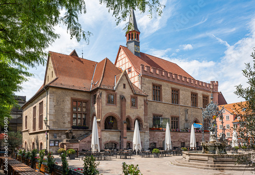 medieval town hall with Gaenseliesel fountain of the university town of Goettingen