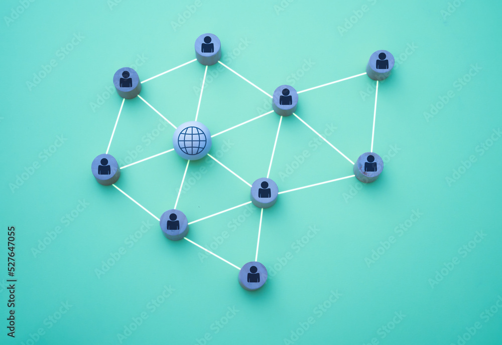 3D illustration of people connection with the network in the form of a mesh represented with wooden pieces on a blue background 3D illustration of people connection with the network in the form of a mesh represented with wooden pieces on a blue background