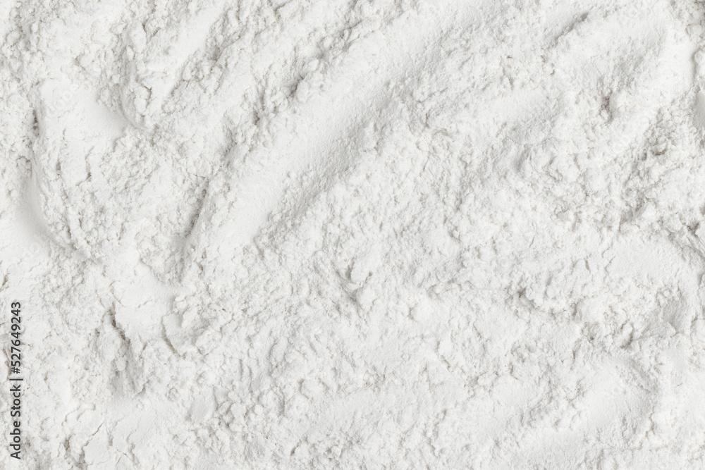 Organic white wheat flour. Top view, full frame photo.