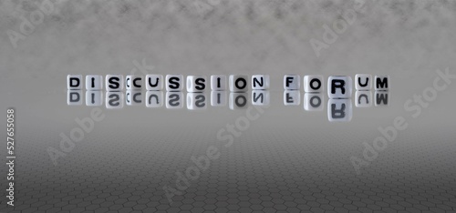 discussion forum word or concept represented by black and white letter cubes on a grey horizon background stretching to infinity