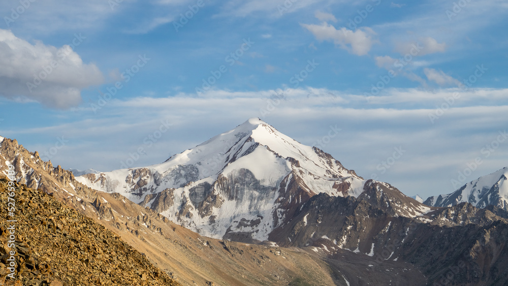 Snowy mountain peak. High Peak