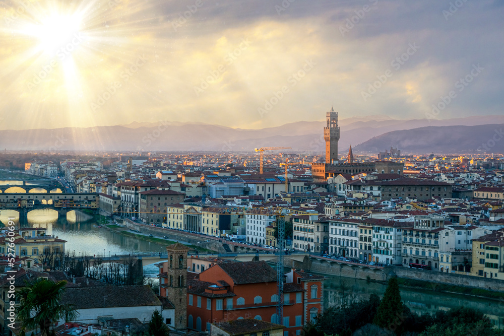 Florence city view rain clouds and sun beams on sky famous architecture of touristic destination 