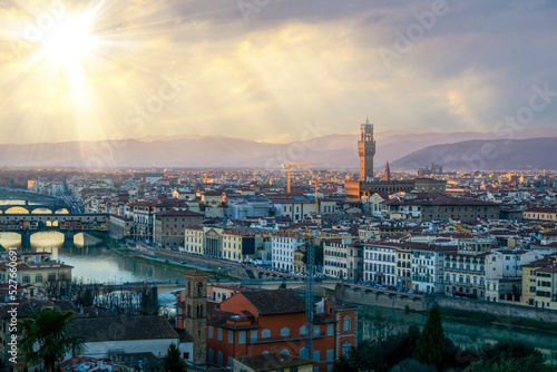 Florence city view rain clouds and sun beams on sky famous architecture of touristic destination 