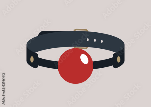 An isolated gag ball on a leather belt, adult toys photo