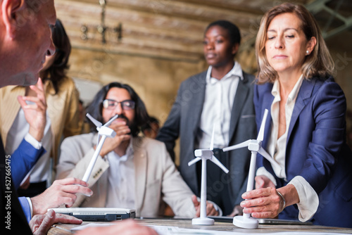 Renewable energy company meeting talking about green and low-pollution technology