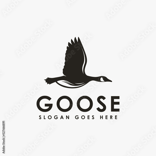 Fotografia Simple Flying Goose logo icon vector on white background