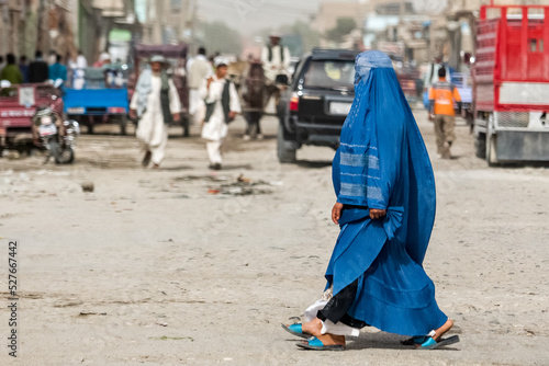 Obraz na płótnie Afghan woman in hijab in Kabul, natives of Afghanistan on streets of the city