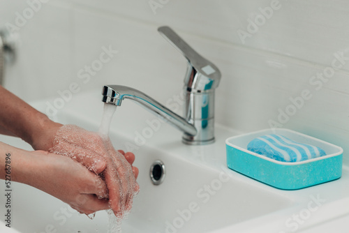 The Girl Washes Her Hands to Avoid Infection With the Virus COVID-19