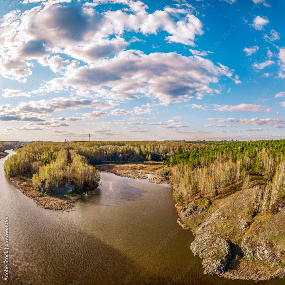 Obraz premium Confluence of the Iset and Kamenka rivers in the city Kamensk-Uralskiy. Iset and Kamenka rivers, Kamensk-Uralskiy, Sverdlovsk region, Ural mountains, Russia. Aerial view