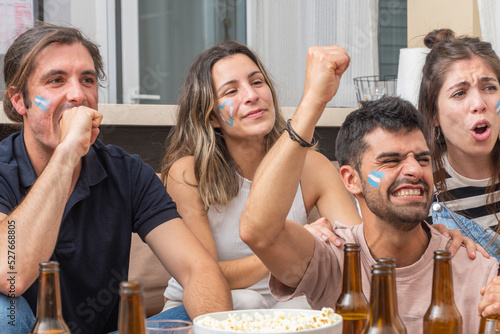 Group of friends watching a soccer match