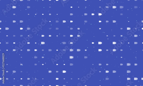 Seamless background pattern of evenly spaced white video camera symbols of different sizes and opacity. Vector illustration on indigo background with stars